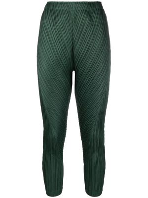 Pleats Please Issey Miyake high-waisted plissé cropped trousers - Green
