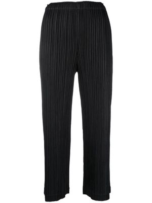 Pleats Please Issey Miyake micro-pleated cropped trousers - Black