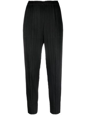 Pleats Please Issey Miyake Monthly Colors September tapered trousers - Black