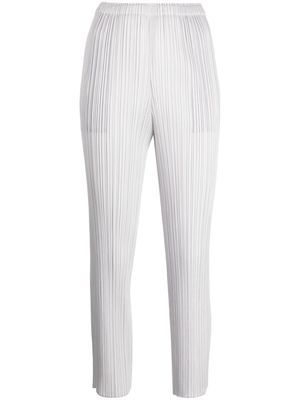 Pleats Please Issey Miyake pleated cropped-leg trousers - Grey