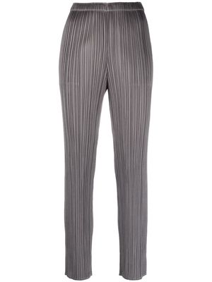 Pleats Please Issey Miyake pleated cropped straight trousers - Grey