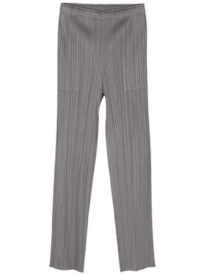 Pleats Please Issey Miyake plissé-satin trousers - Grey