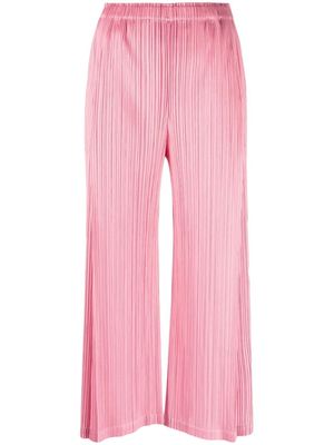 Pleats Please Issey Miyake September plissé-effect cropped trousers - Pink