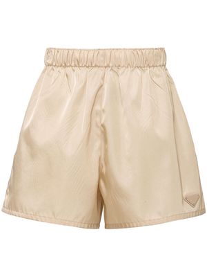 Prada enamel triangle logo re-nylon shorts - Neutrals