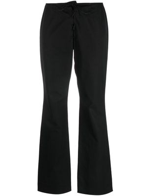 Prada Pre-Owned 1990s lace-up bootcut trousers - Black
