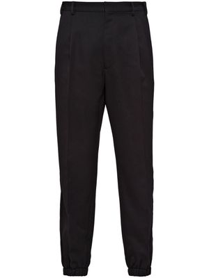 Prada pressed-crease velvet tapered trousers - Black