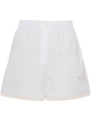 Prada triangle-logo lace-trimmed shorts - White