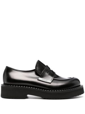 Premiata logo-tag leather loafers - Black