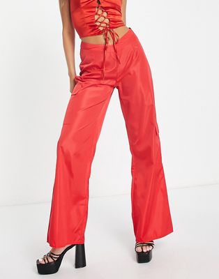 Public Desire deep v front cargo pants in red