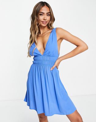 Pull & Bear elasticated waist mini dress with open back detail in blue