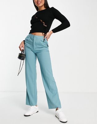 Pull & Bear mid waist loose fitting pants in teal-Green