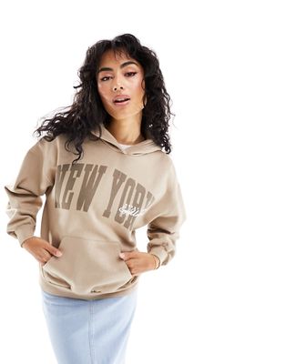 Pull & Bear New York graphic oversized hoodie in beige-Neutral