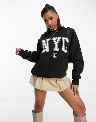 Pull & Bear 'NYC' varsity oversized sweatshirt in black