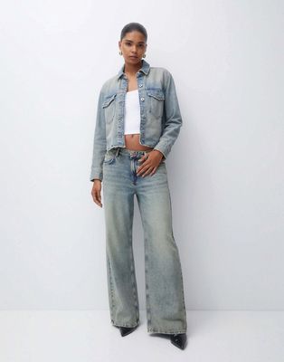 Pull & Bear oversized baggy low waist jeans in washed blue