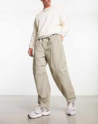 Pull & Bear parachute pants in beige-Neutral