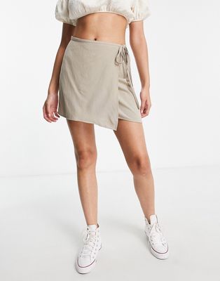 Pull & Bear tie side detail mini skirt in sand-Neutral