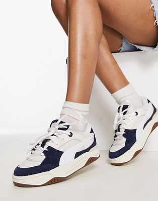 PUMA 180 sneakers in chalk and navy with gum sole-Gray