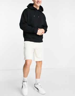 Puma Classics jersey shorts in off white