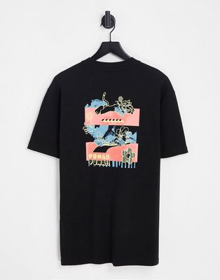PUMA Downtown graphic T-shirt in black and pink