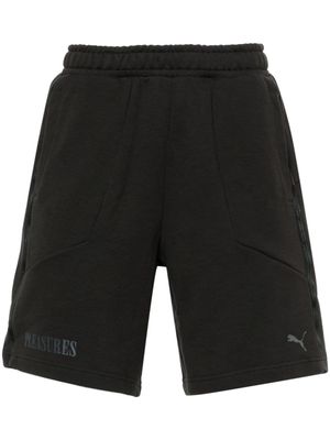 PUMA x PLEASURES logo-print track shorts - Black