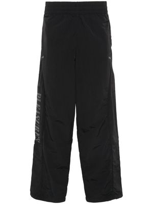 PUMA x Pleasures logo-print trousers - Black