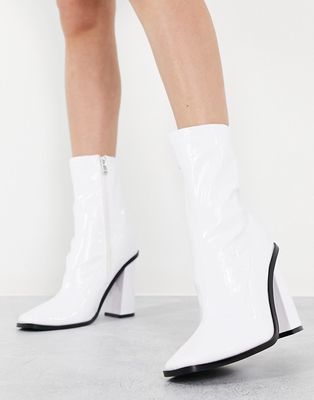 RAID Saylor block heel sock boot in white patent