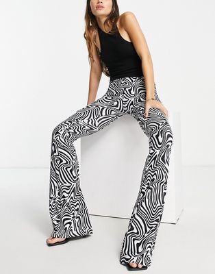 Rebellious Fashion flared pants in swirl print-Multi