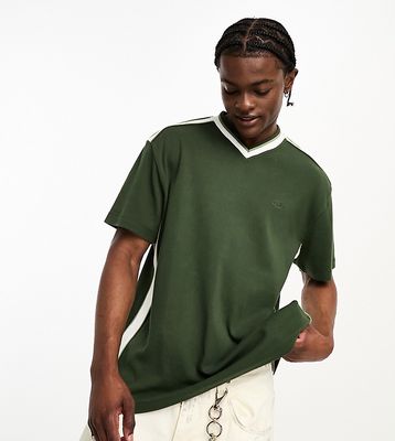 Reclaimed Vintage branded v-neck t-shirt in green