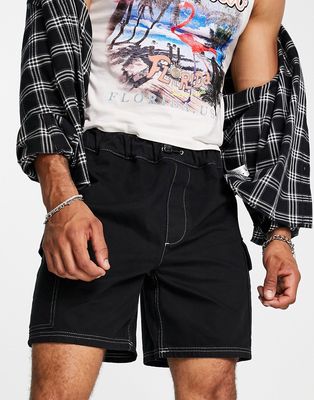 Reclaimed Vintage Inspired baggy black shorts with white contrast stitch