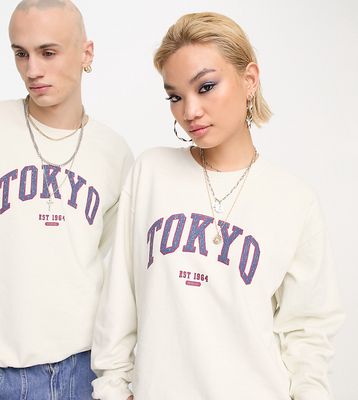 Reclaimed Vintage unisex Tokyo varsity crew neck sweatshirt in ecru-Neutral