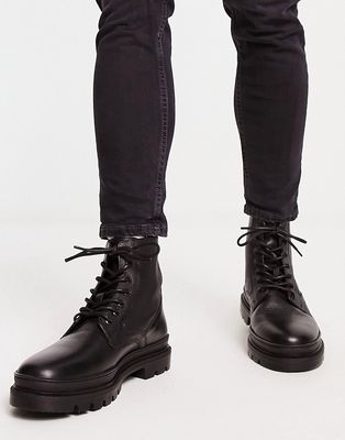 Red Tape chunky sole lace up boots in black leather