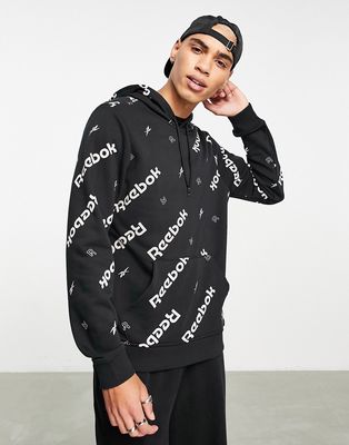 Reebok all-over print hoodie in black
