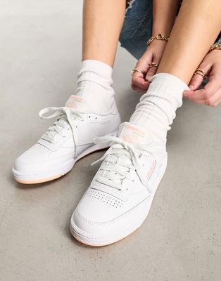 Reebok Club C 85 sneakers in white with peach detail