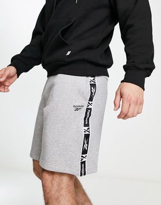 Reebok taping logo shorts in gray