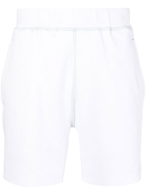 Reigning Champ logo-embroidered track shorts - White