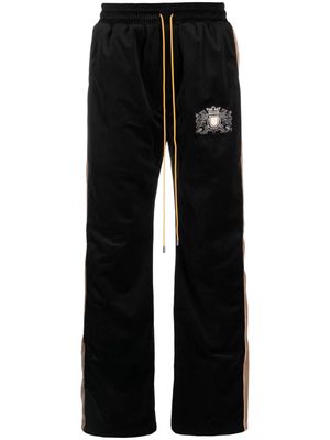 Rhude crest-embroidered velvet track pants - Black