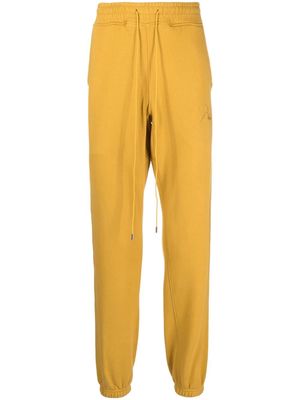 Rhude embroidered-logo drawstring track pants - Yellow