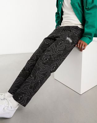 RIPNDIP wide leg casual pants in black with all over cat print