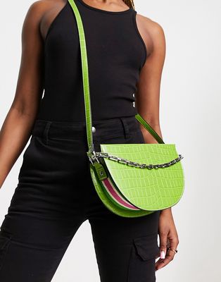 River Island croc saddle bag with chain and pink piping detail in green
