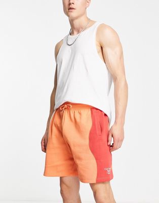 River Island ombre waved shorts in orange