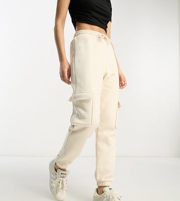 River Island Petite cargo pants with pocket detail in beige-Neutral