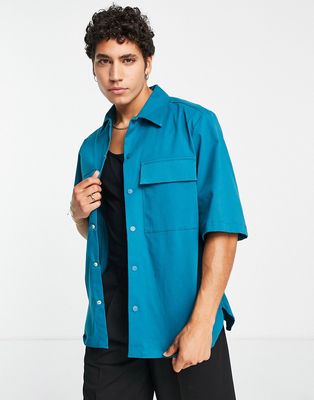 River Island short sleeve studio boxy twill shirt in turquoise-Blue