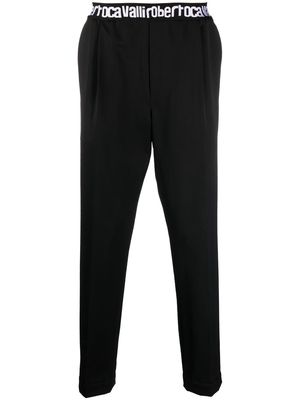 Roberto Cavalli logo-waist tapered trousers - Black