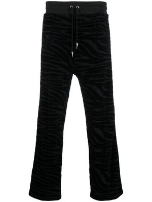Roberto Cavalli patterned-jacquard track pants - 05051