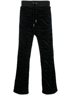 Roberto Cavalli patterned-jacquard track pants - Black