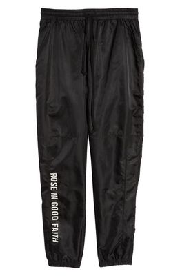 ROSE IN GOOD FAITH Paneled Water Repellent Track Pants in Black