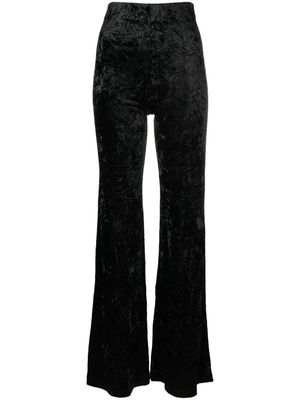 ROTATE crushed-velvet flared trousers - Black