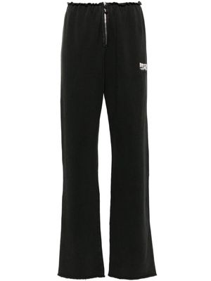 ROTATE Enzyme embroidered-logo trousers - Black