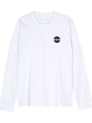 sacai embroidered-slogan T-shirt - White