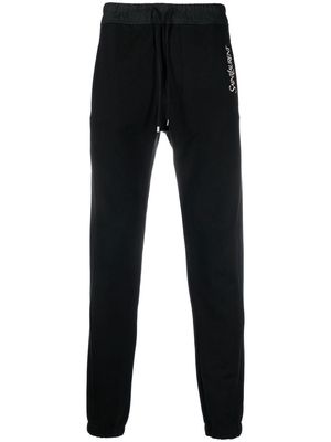 Saint Laurent embroidered-logo cotton track pants - Black
